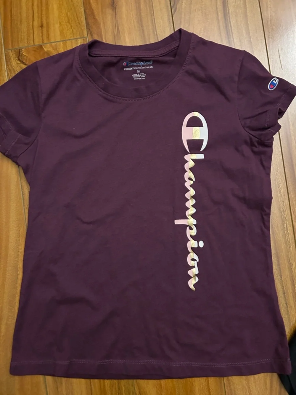 Champion Short-Sleeve Tee in Plum with Iridescent Logo Kid’s size m
